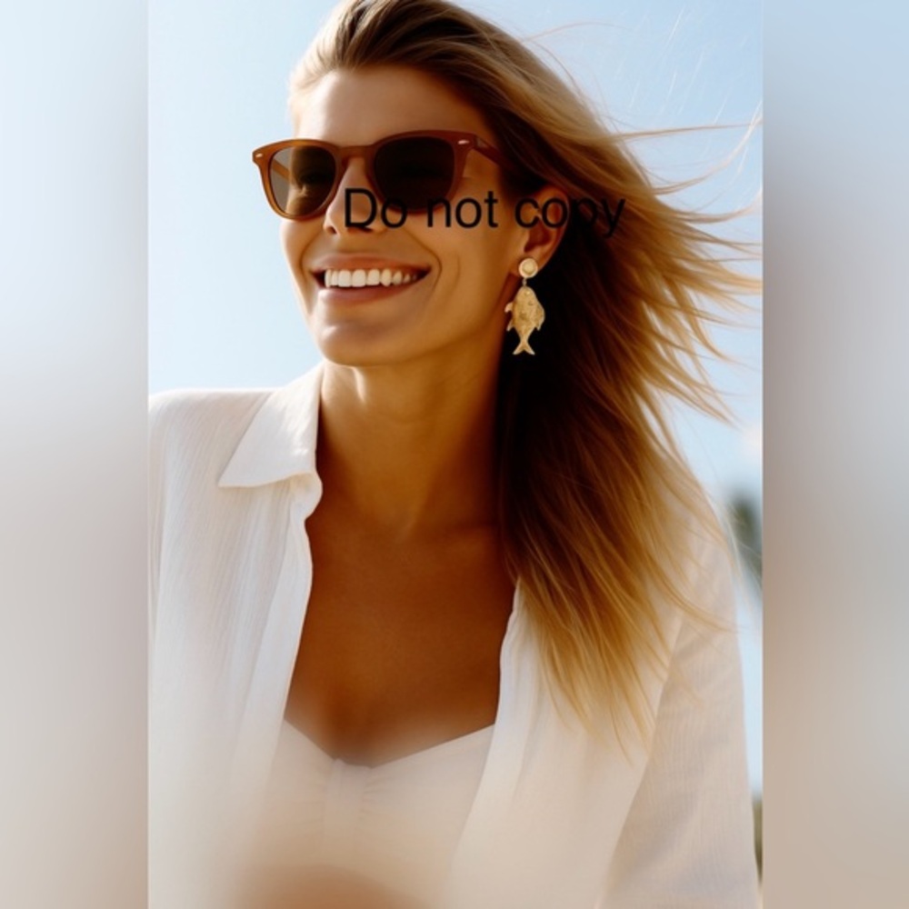 Brand new Gold Fish Dangle Light Earrings